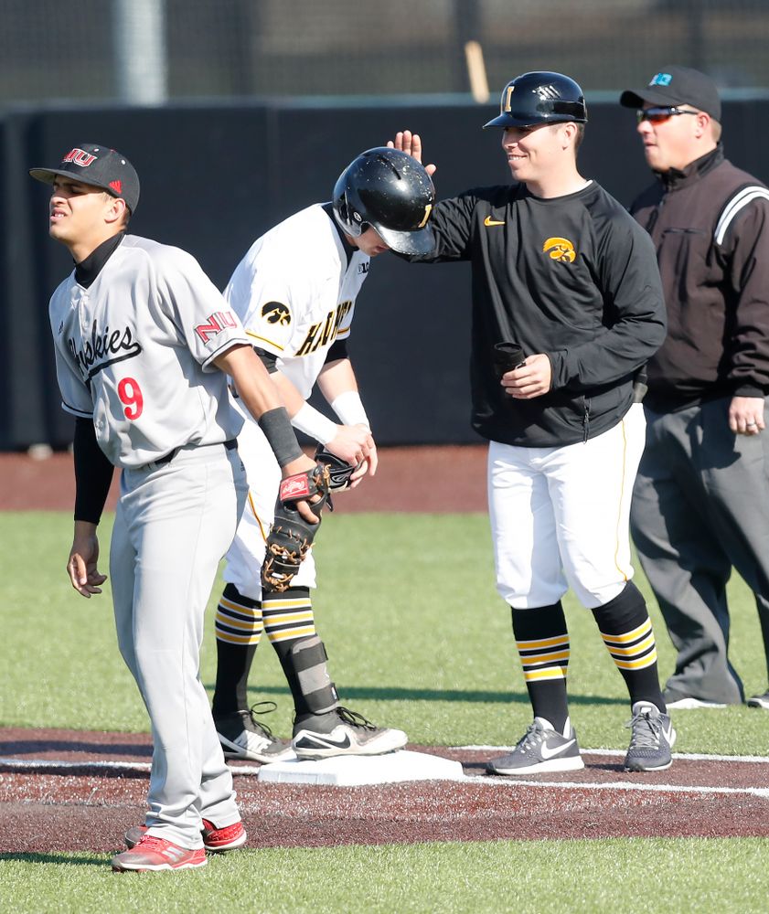 Iowa Hawkeyes infielder Mitchell Boe (4) and volunteer coach Sean Moore against Northern Illinois Tuesday, April 17, 2018 at Duane Banks Field. (Brian Ray/hawkeyesports.com)