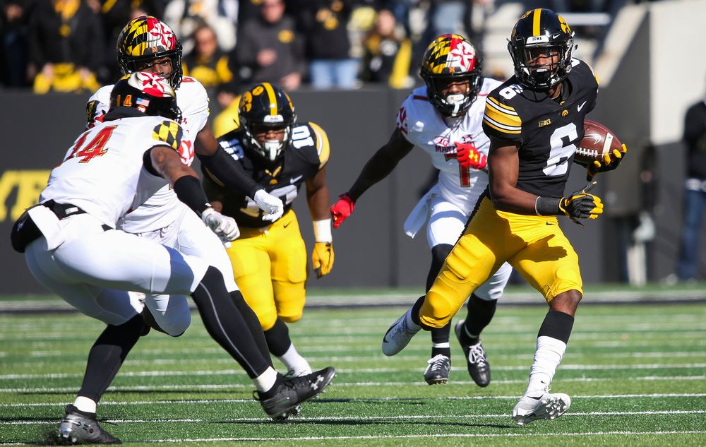 Iowa Hawkeyes wide receiver Ihmir Smith-Marsette (6) runs the ball during a game against Maryland at Kinnick Stadium on October 20, 2018. (Tork Mason/hawkeyesports.com)