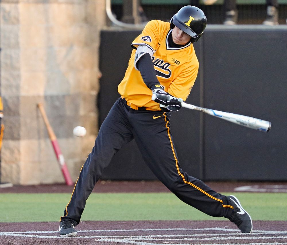 Iowa Hawkeyes pinch hitter Grant Judkins (7) drives a pitch for a hit during the eighth inning of their game at Duane Banks Field in Iowa City on Tuesday, Apr. 2, 2019. (Stephen Mally/hawkeyesports.com)