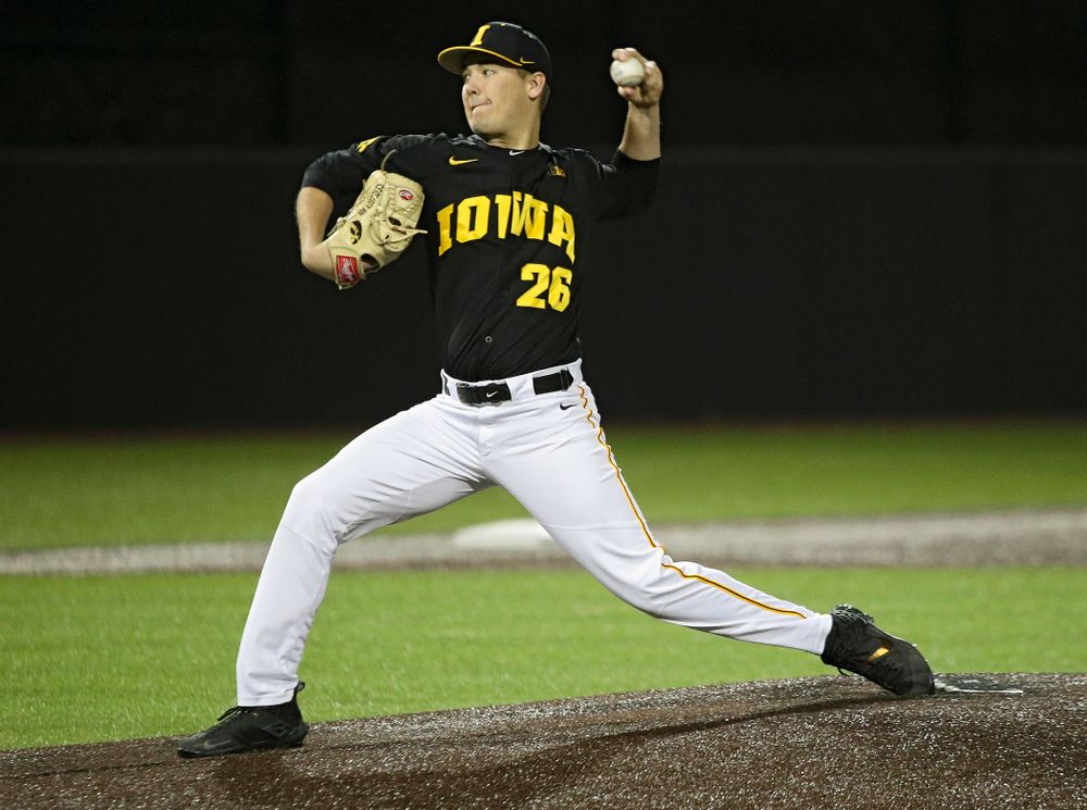 Iowa pitcher Adam Ketelsen (26) delivers to the plate during the eighth inning of their game at Duane Banks Field in Iowa City on Tuesday, March 3, 2020. (Stephen Mally/hawkeyesports.com)