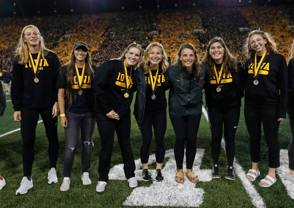 Members of the Iowa rowing team are recognized by the Presidential Committee on Athletics at halftime during a game against Wisconsin on September 22, 2018. (Tork Mason/hawkeyesports.com)
