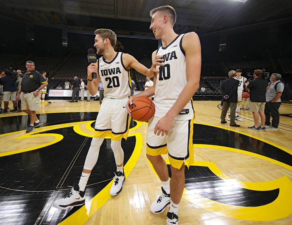 Iowa Hawkeyes forward Riley Till (20) laughs and pushes guard Joe Wieskamp (10) away after asking him a question during Iowa Men’s Basketball Media Day at Carver-Hawkeye Arena in Iowa City on Wednesday, Oct 9, 2019. (Stephen Mally/hawkeyesports.com)