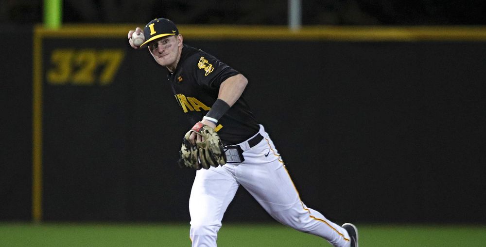 Iowa infielder Brendan Sher (2) throws to first for an out during the ninth inning of their game at Duane Banks Field in Iowa City on Tuesday, March 3, 2020. (Stephen Mally/hawkeyesports.com)