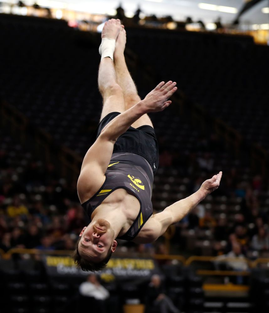 Dylan Ellsworth competes on the floor against Minnesota and Air Force 