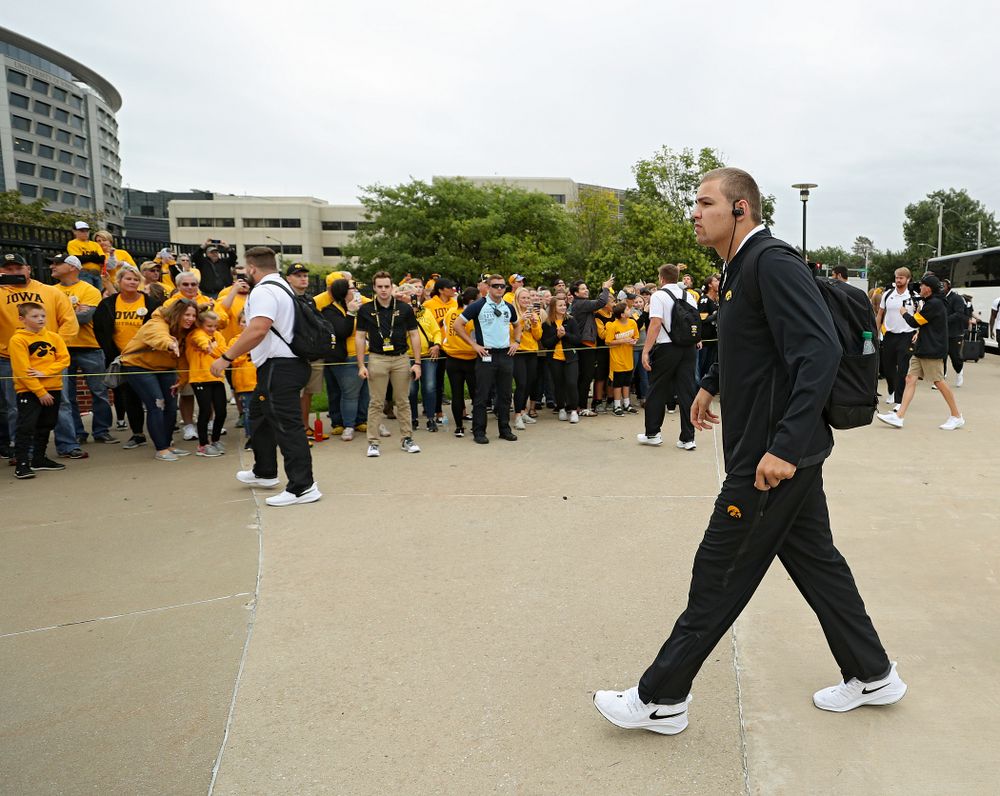 Iowa Hawkeyes quarterback Nate Stanley (4) arrives with his team before their game at Kinnick Stadium in Iowa City on Saturday, Sep 28, 2019. (Stephen Mally/hawkeyesports.com)