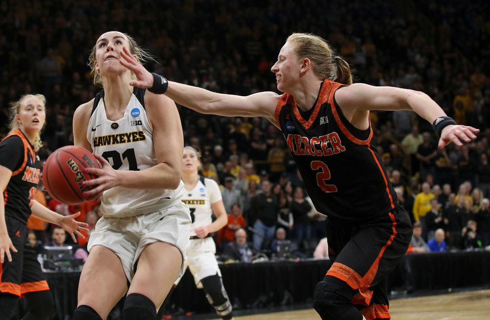 Iowa Hawkeyes forward Hannah Stewart (21) eyes the basket before scoring during the first round of the 2019 NCAA Women's Basketball Tournament at Carver Hawkeye Arena in Iowa City on Friday, Mar. 22, 2019. (Stephen Mally for hawkeyesports.com)