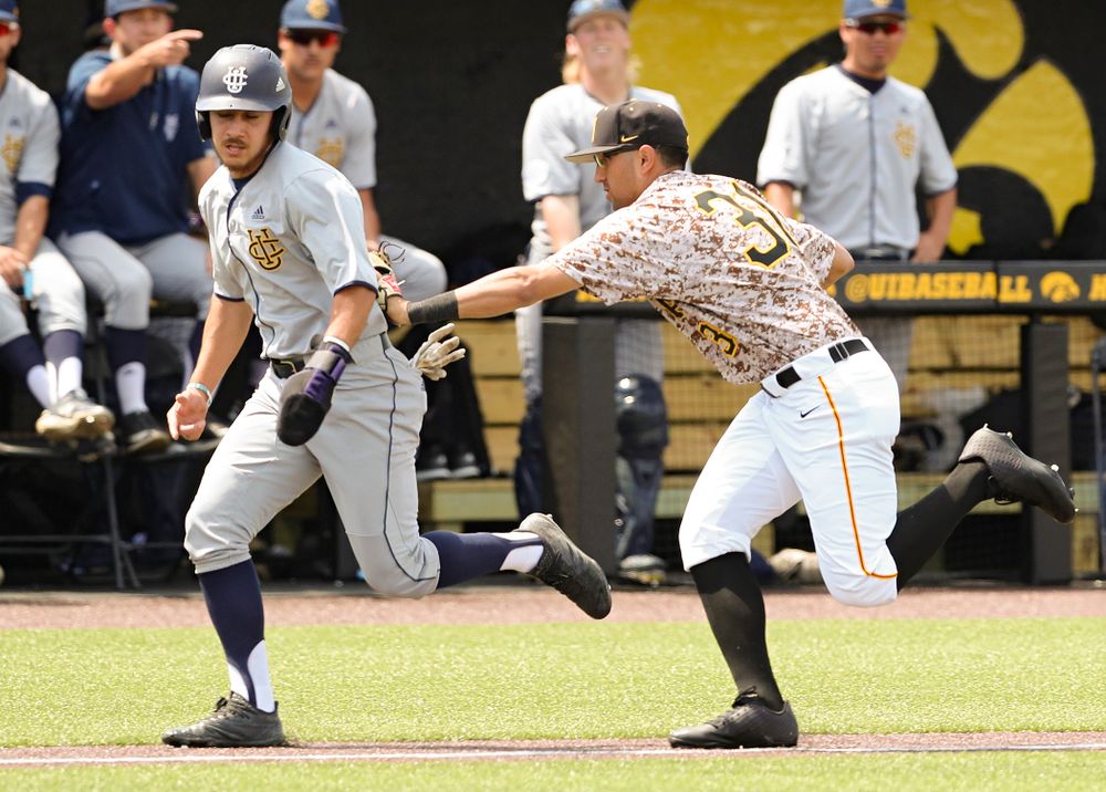Iowa Hawkeyes third baseman Matthew Sosa (31) tags out a runner during the third inning of their game against UC Irvine at Duane Banks Field in Iowa City on Sunday, May. 5, 2019. (Stephen Mally/hawkeyesports.com)