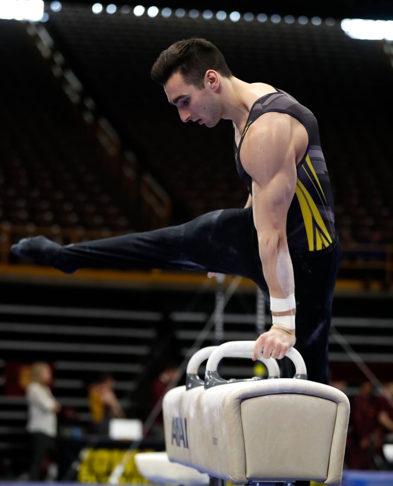 Austin Hodges competes on the pommel horse  against Minnesota and Air Force 