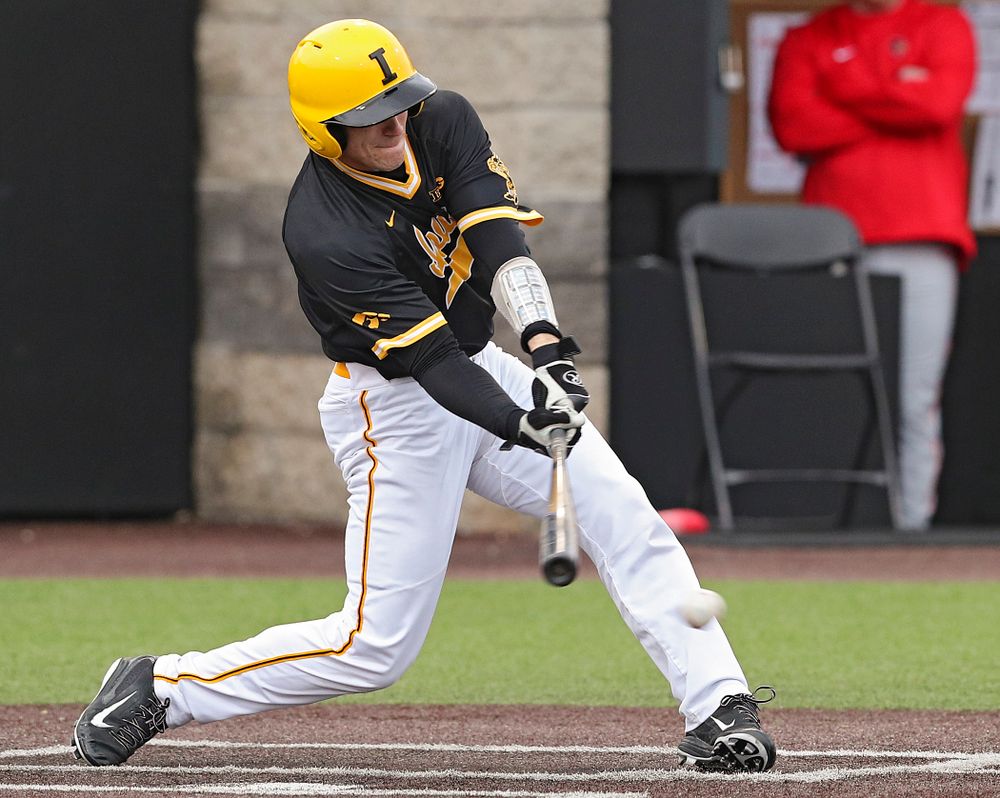 Iowa Hawkeyes catcher Austin Martin (34) drives a pitch for a hit during the third inning of their game against Illinois State at Duane Banks Field in Iowa City on Wednesday, Apr. 3, 2019. (Stephen Mally/hawkeyesports.com)