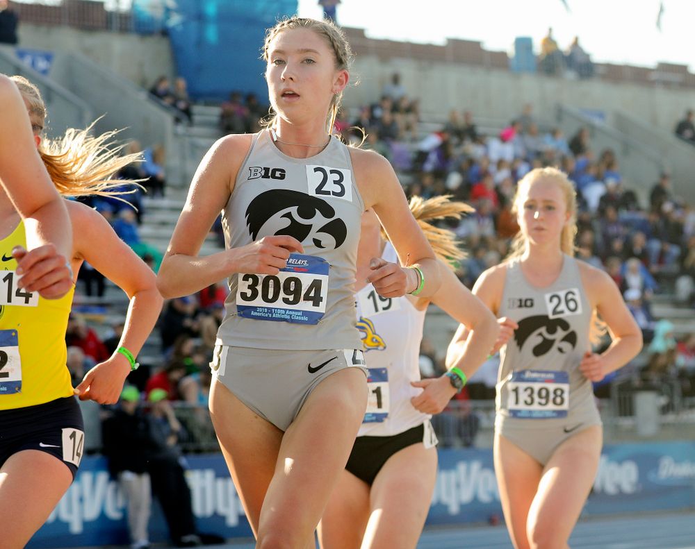 Iowa's Jessica McKee (left) and Kylie Latham (right) run the women's 10,000 meter event during the first day of the Drake Relays at Drake Stadium in Des Moines on Thursday, Apr. 25, 2019. (Stephen Mally/hawkeyesports.com)