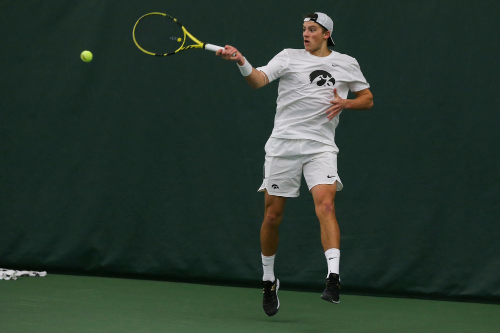Iowa’s Joe Tyler hits a forehand during the Iowa men’s tennis match vs Western Michigan on Saturday, January 18, 2020 at the Hawkeye Tennis and Recreation Complex. (Lily Smith/hawkeyesports.com)