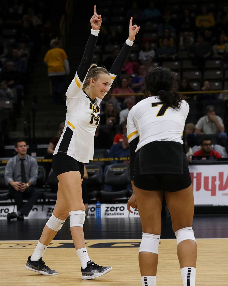 Iowa Hawkeyes outside hitter Cali Hoye (14) celebrates after winning a point during a match against Rutgers at Carver-Hawkeye Arena on November 2, 2018. (Tork Mason/hawkeyesports.com)