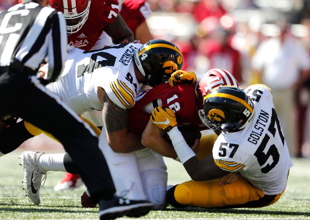 Iowa Hawkeyes defensive end A.J. Epenesa (94) and defensive end Chauncey Golston (57) against the Indiana Hoosiers Saturday, October 13, 2018 at Memorial Stadium, in Bloomington, Ind. (Brian Ray/hawkeyesports.com)
