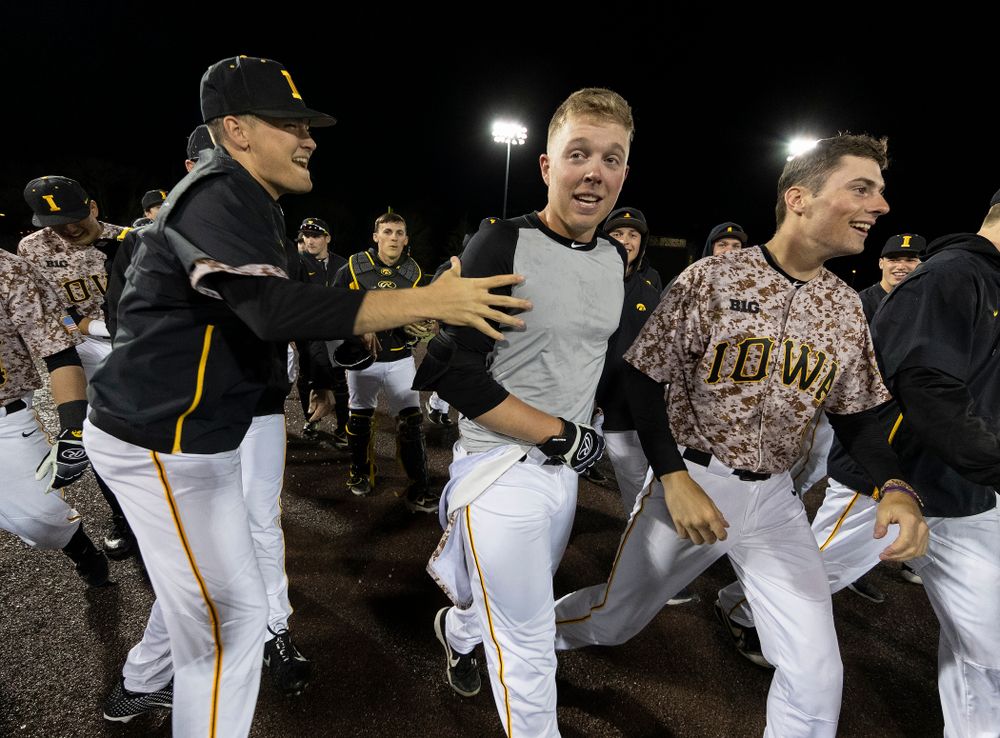 Iowa Hawkeyes Zeb Adreon (5) celebrates with his teammates after driving in the game winning run in the bottom of the 9th against the Nebraska Cornhuskers on Military Appreciation Night Friday, April 19, 2019 at Duane Banks Field. (Brian Ray/hawkeyesports.com)