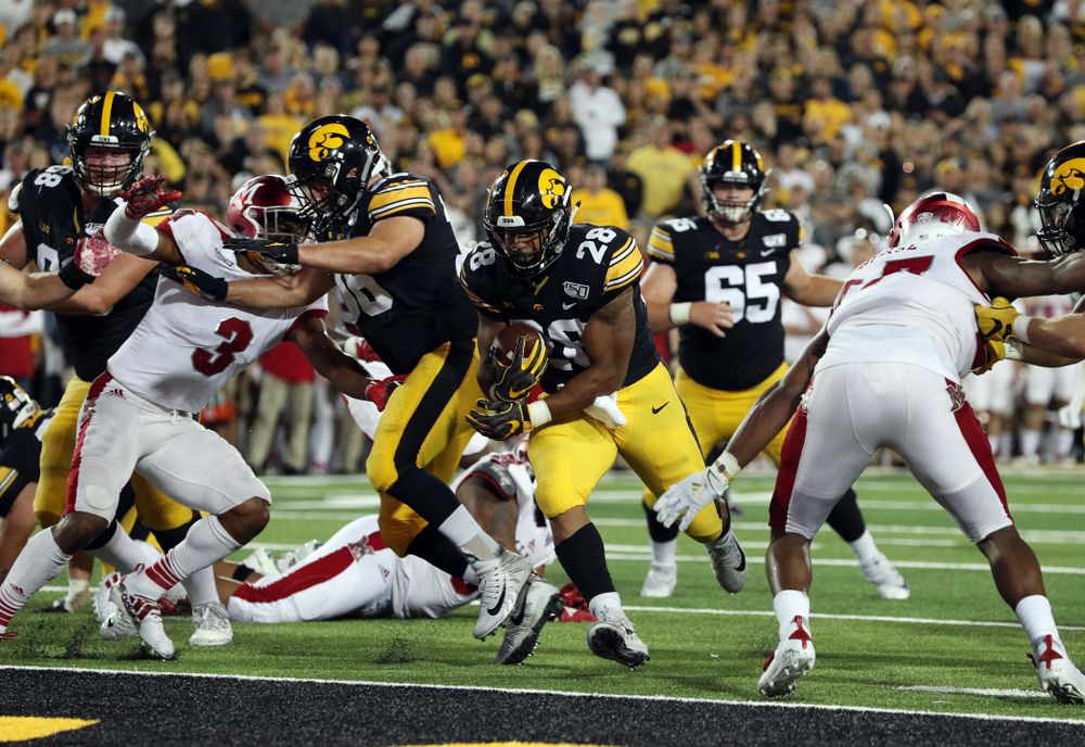 Iowa Hawkeyes running back Toren Young (28) scores a touchdown against the Miami RedHawks Saturday, August 31, 2019 at Kinnick Stadium in Iowa City. (Brian Ray/hawkeyesports.com)