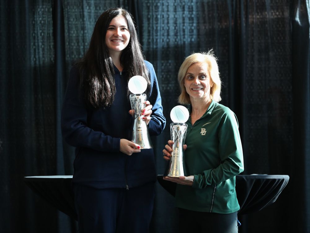 Iowa Hawkeyes forward Megan Gustafson (10) stands with Baylor Lady Bears head coach Kim Mulkey during a news conference to announce that Gustafson had won the AP Player of the Year and Mulkey had won the AP Coach of the Year  Wednesday, April 4, 2018 at Amalie Arena in Tampa, FL. (Brian Ray/hawkeyesports.com)