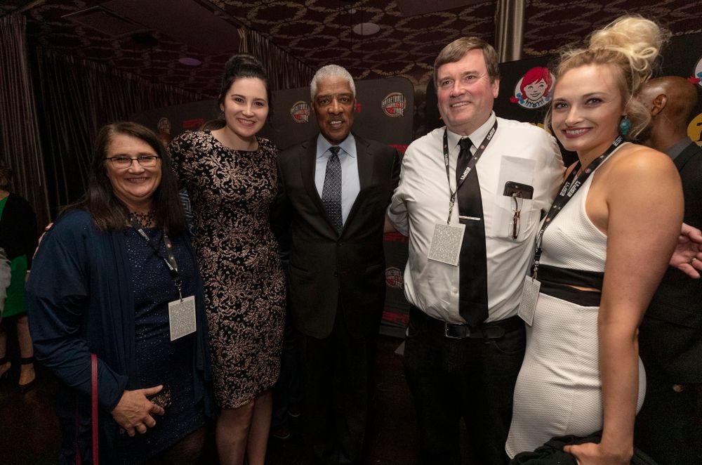 Iowa Hawkeyes forward Megan Gustafson (10) and her family with NBA great Julius Erving before the ESPN College Basketball Awards show Friday, April 12, 2019 at The Novo at LA Live.  (Brian Ray/hawkeyesports.com)