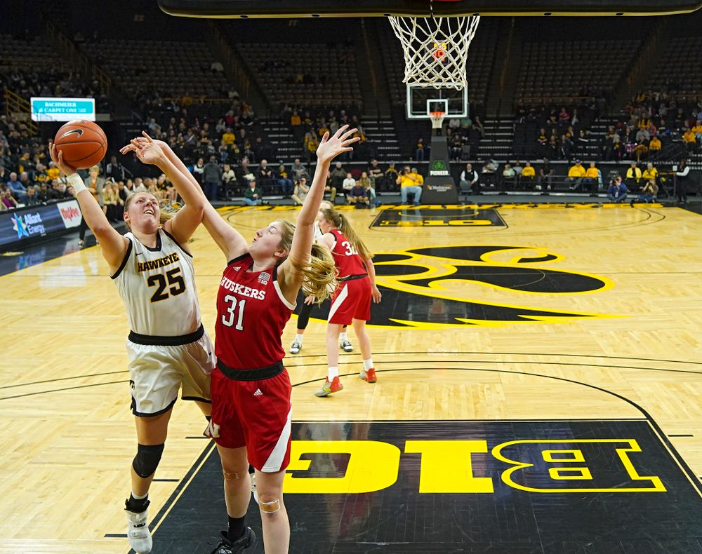 Iowa Hawkeyes forward Monika Czinano (25) puts up a shot during the second quarter of the game at Carver-Hawkeye Arena in Iowa City on Thursday, February 6, 2020. (Stephen Mally/hawkeyesports.com)