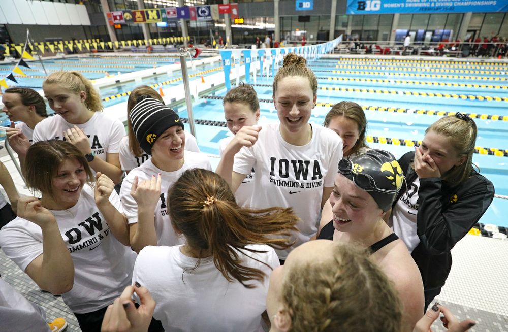 Iowa’s Kelsey Drake is greeted by teammates after she broke a school record in a 200 yard butterfly time trial during the 2020 Big Ten Women’s Swimming and Diving Championships at the Campus Recreation and Wellness Center in Iowa City on Wednesday, February 19, 2020. (Stephen Mally/hawkeyesports.com)