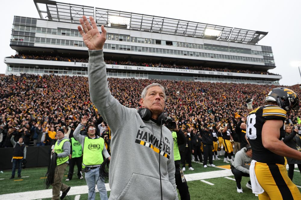 Iowa Hawkeyes head coach Kirk Ferentz waves to the kids in the Stead Family Children's Hospital at the end of the first quarter of their game against the Nebraska Cornhuskers Friday, November 23, 2018 at Kinnick Stadium. (Brian Ray/hawkeyesports.com)