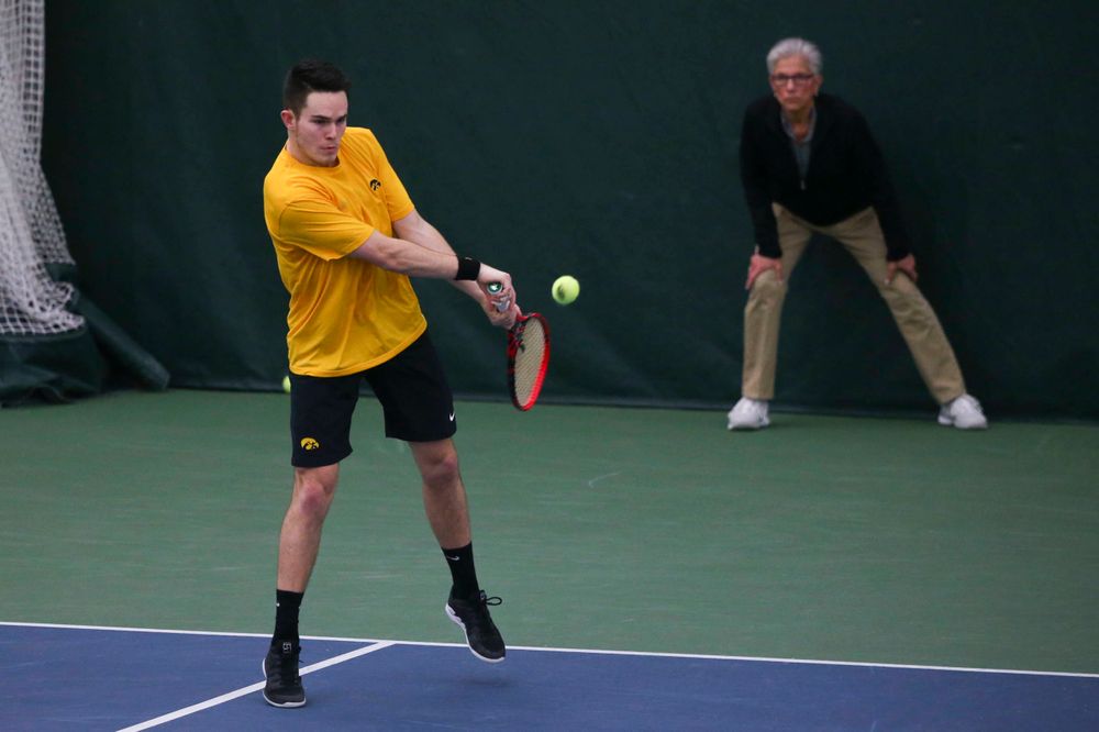 Jonas Larsen at a tennis match vs Drake  Friday, March 8, 2019 at the Hawkeye Tennis and Recreation Complex. (Lily Smith/hawkeyesports.com)