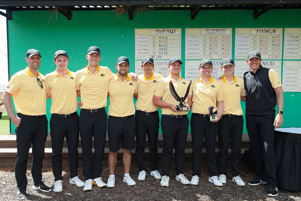 The Iowa Hawkeyes pose with their team trophy after winning the Hawkeye Invitational at Finkbine Golf Course in Iowa City on Sunday, Apr. 21, 2019. (Stephen Mally/hawkeyesports.com)