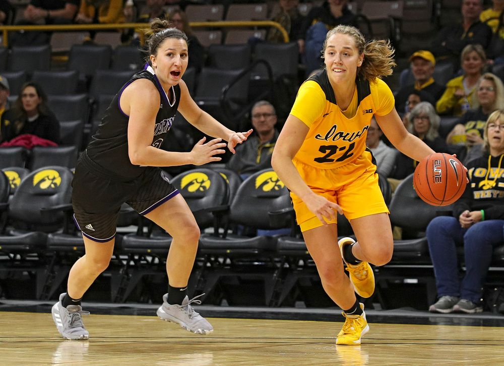 Iowa guard Kathleen Doyle (22) drives in with the ball during the first quarter of their game against Winona State at Carver-Hawkeye Arena in Iowa City on Sunday, Nov 3, 2019. (Stephen Mally/hawkeyesports.com)