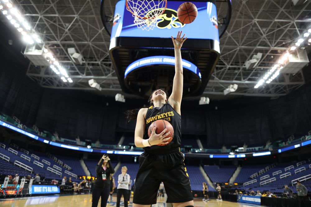 Iowa Hawkeyes forward Megan Gustafson (10) does the Mikan Drill the ESPN Crew following practice for their Sweet 16 matchup against NC State Friday, March 29, 2019 at the Greensboro Coliseum in Greensboro, NC.(Brian Ray/hawkeyesports.com)