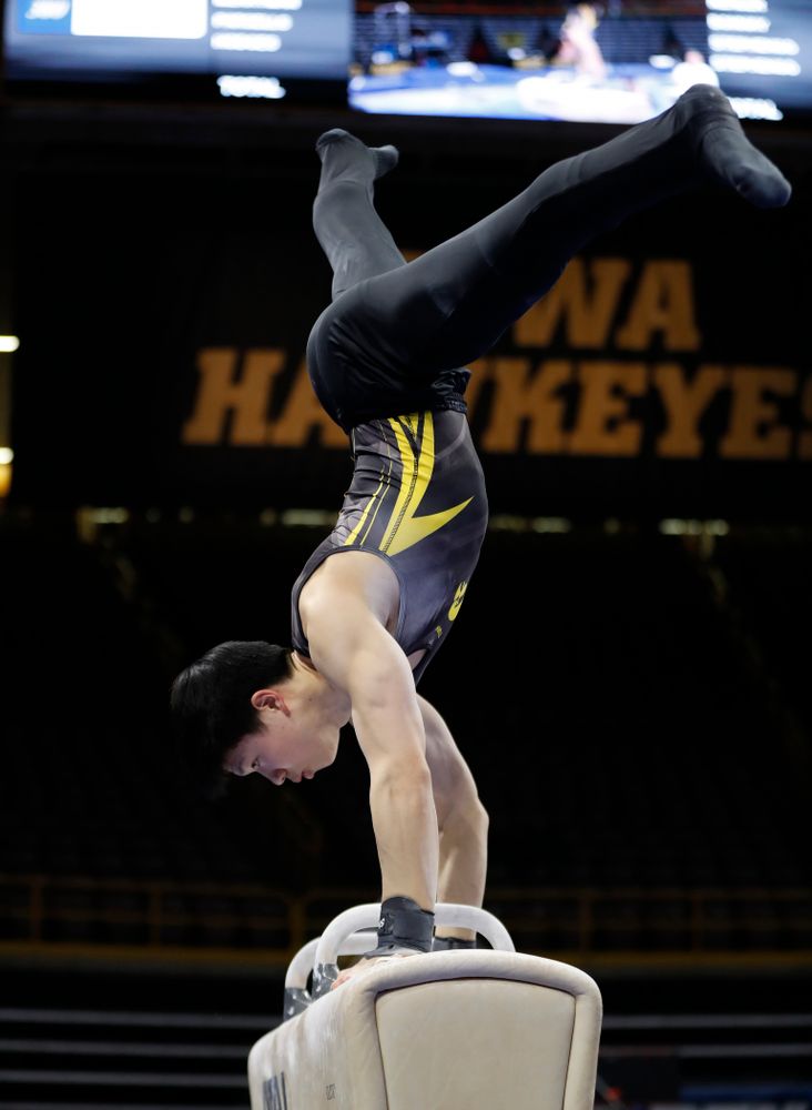 Iowa's Bennet Huang competes on the pommel horse 