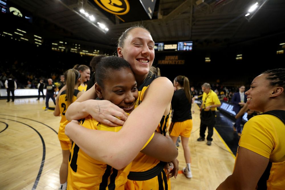Iowa Hawkeyes forward Amanda Ollinger (43) and guard Zion Sanders (21) during senior day activities following their win over the Minnesota Golden Gophers Thursday, February 27, 2020 at Carver-Hawkeye Arena. (Brian Ray/hawkeyesports.com)