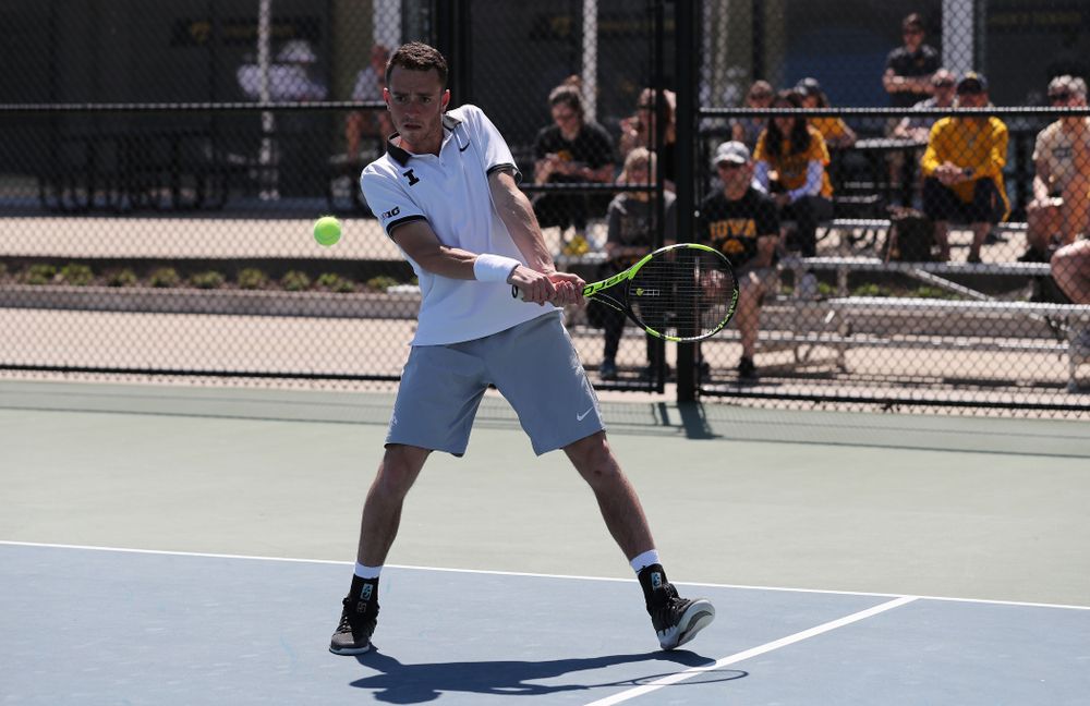 IowaÕs Kareem Allaf and Jonas Larsen play a doubles match against the Michigan Wolverines Sunday, April 21, 2019 at the Hawkeye Tennis and Recreation Complex. (Brian Ray/hawkeyesports.com)