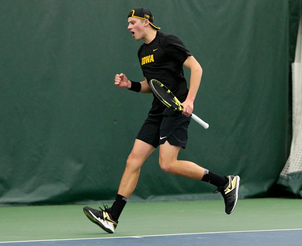 Iowa’s Joe Tyler celebrates a point during his singles match at the Hawkeye Tennis and Recreation Complex in Iowa City on Friday, February 14, 2020. (Stephen Mally/hawkeyesports.com)