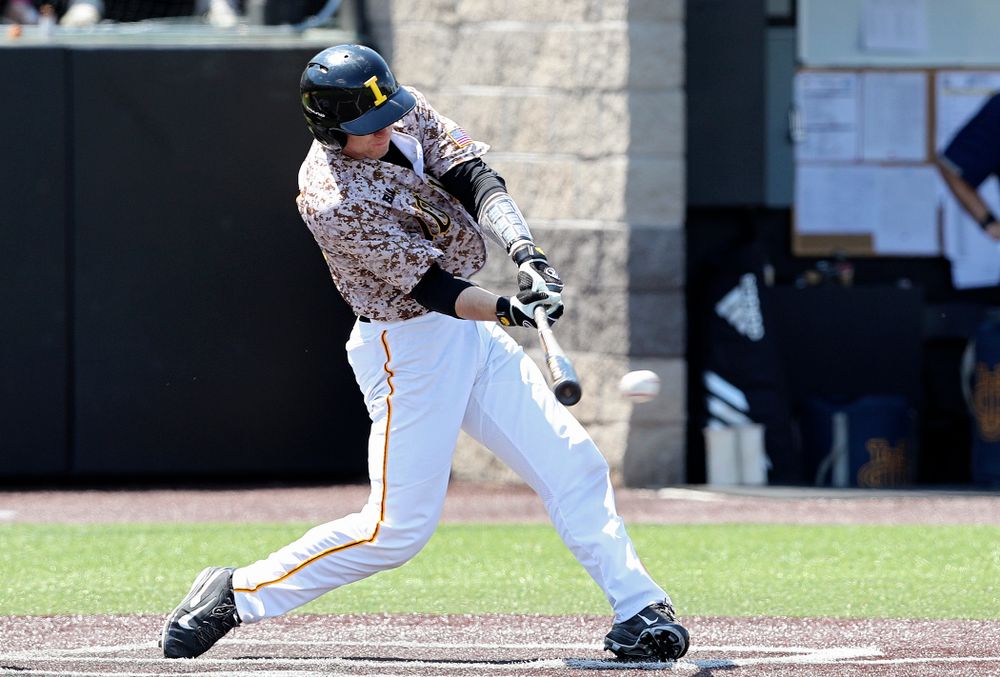 Iowa Hawkeyes catcher Austin Martin (34) drives a pitch for a hit during the third inning of their game against UC Irvine at Duane Banks Field in Iowa City on Sunday, May. 5, 2019. (Stephen Mally/hawkeyesports.com)
