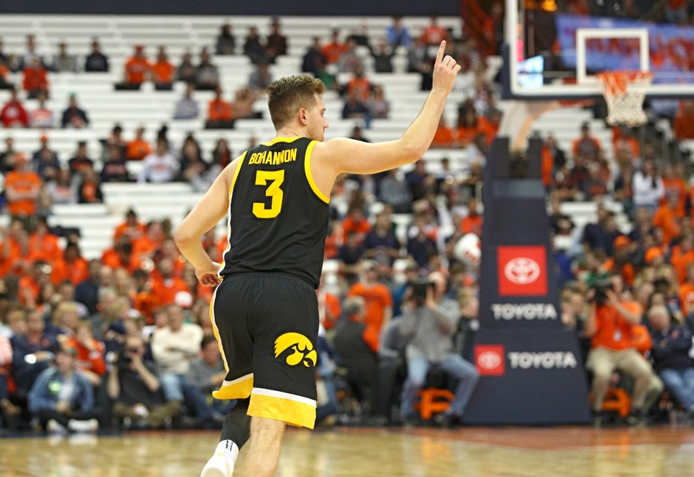 Iowa Hawkeyes guard Jordan Bohannon (3) runs down the court after mkaing a 3-pointer during the second half of their ACC/Big Ten Challenge game at the Carrier Dome in Syracuse, N.Y. on Tuesday, Dec 3, 2019. (Stephen Mally/hawkeyesports.com)