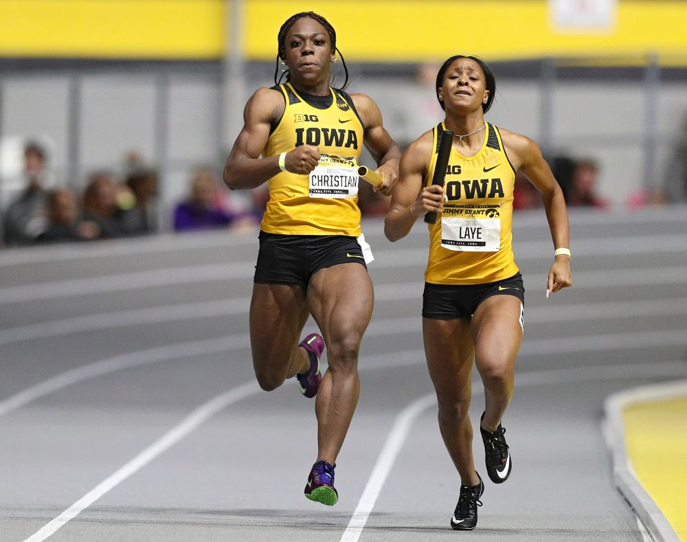 Iowa’s Antonise Christian (from left) and Jada Laye run the women’s 1600 meter relay event during the Jimmy Grant Invitational at the Recreation Building in Iowa City on Saturday, December 14, 2019. (Stephen Mally/hawkeyesports.com)