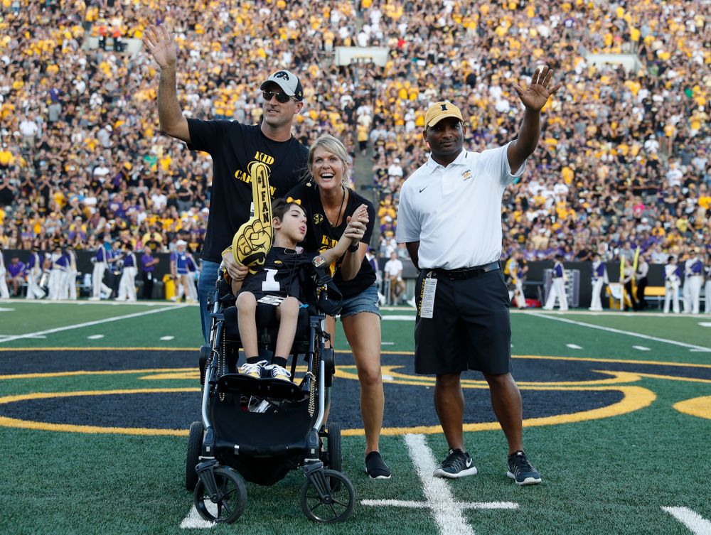 Kid Captain Quinn Stumpf and honorary captain Marvin Sims, Jr. against the Northern Iowa Panthers Saturday, September 15, 2018 at Kinnick Stadium. (Brian Ray/hawkeyesports.com)