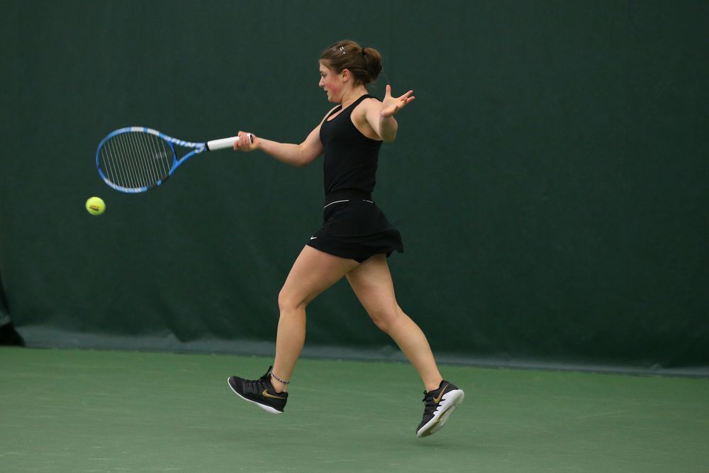 Iowa’s Erika Dodridge returns a hit during the Iowa women’s tennis meet vs UNI  on Saturday, February 29, 2020 at the Hawkeye Tennis and Recreation Complex. (Lily Smith/hawkeyesports.com)