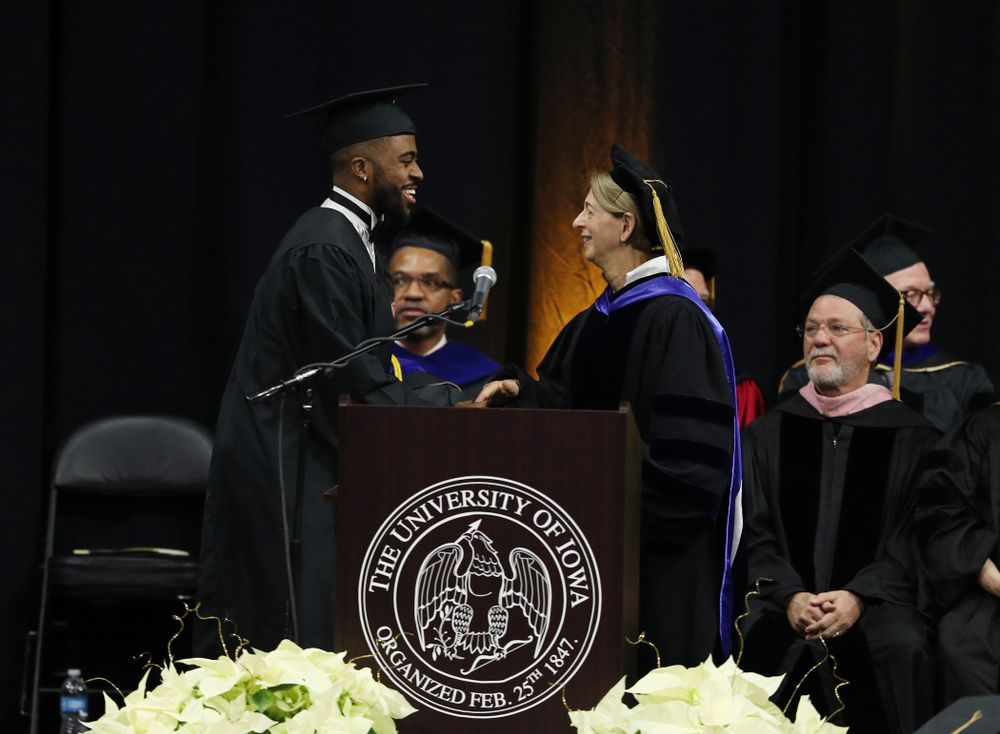Iowa Track's Christian Brissett during the Fall Commencement Ceremony  Saturday, December 15, 2018 at Carver-Hawkeye Arena. (Brian Ray/hawkeyesports.com)