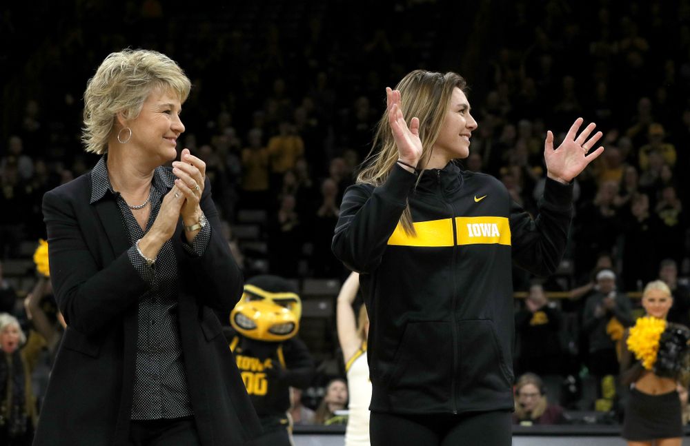 Former Hawkeye Hannah Stewart waves after being introduced before their game against Clemson Wednesday, December 4, 2019 at Carver-Hawkeye Arena. (Brian Ray/hawkeyesports.com)