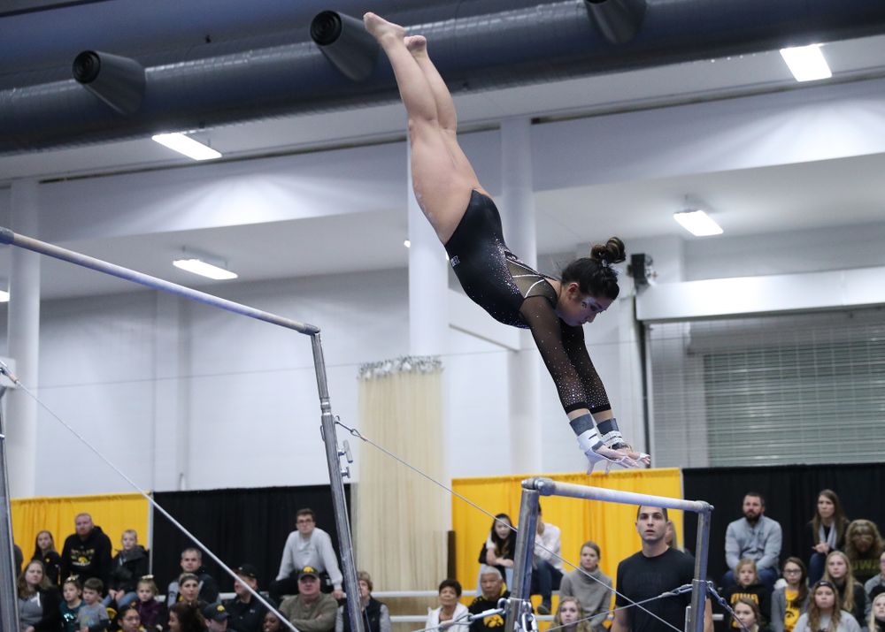 Nicole Chow competes on the bars during the Black and Gold intrasquad meet Saturday, December 1, 2018 at the University of Iowa Field House. (Brian Ray/hawkeyesports.com)