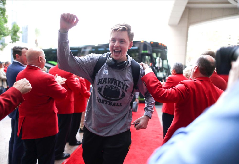 Iowa Hawkeyes quarterback Spencer Petras (7) shakes hands with the ÒRed CoatsÓ after arriving in San Diego, CA Saturday, December 21, 2019 for the Holiday Bowl. (Brian Ray/hawkeyesports.com)