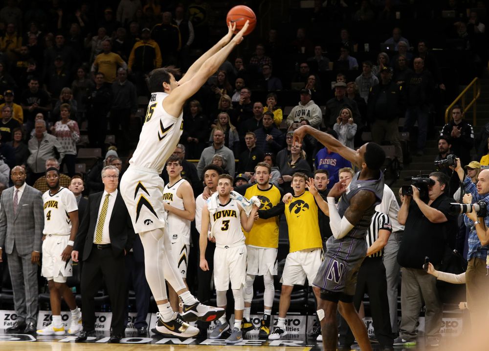 Iowa Hawkeyes forward Ryan Kriener (15) tips the inbounds pass on the last play of the Iowa Hawkeyes game against the Northwestern Wildcats Sunday, February 10, 2019 at Carver-Hawkeye Arena. (Brian Ray/hawkeyesports.com)