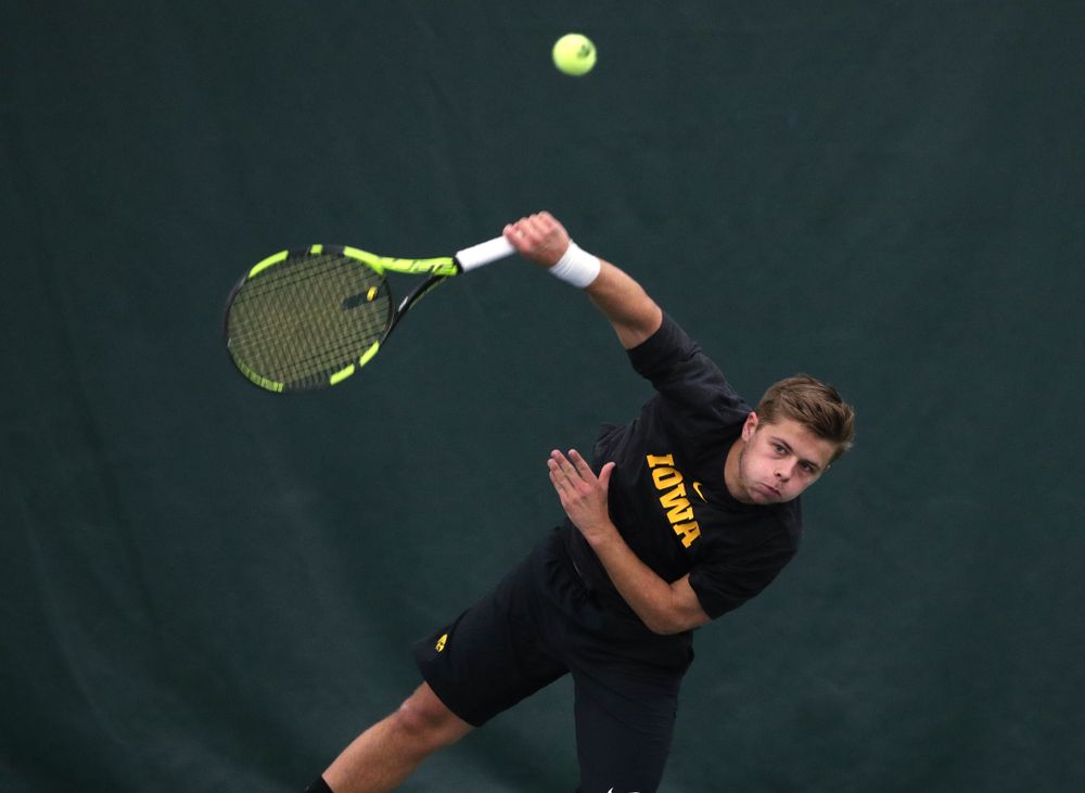 Will Davies and Oliver Okonkwo plays a doubles match against the Miami Hurricanes Friday, February 8, 2019 at the Hawkeye Tennis and Recreation Complex. (Brian Ray/hawkeyesports.com)