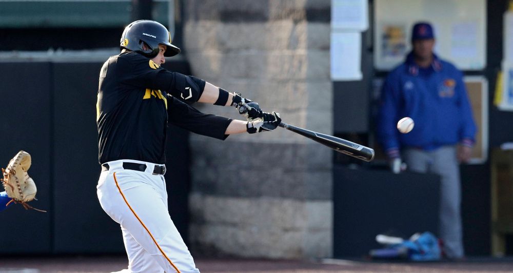 Iowa first baseman Peyton Williams (45) hits a double during the third inning of their college baseball game at Duane Banks Field in Iowa City on Tuesday, March 10, 2020. (Stephen Mally/hawkeyesports.com)