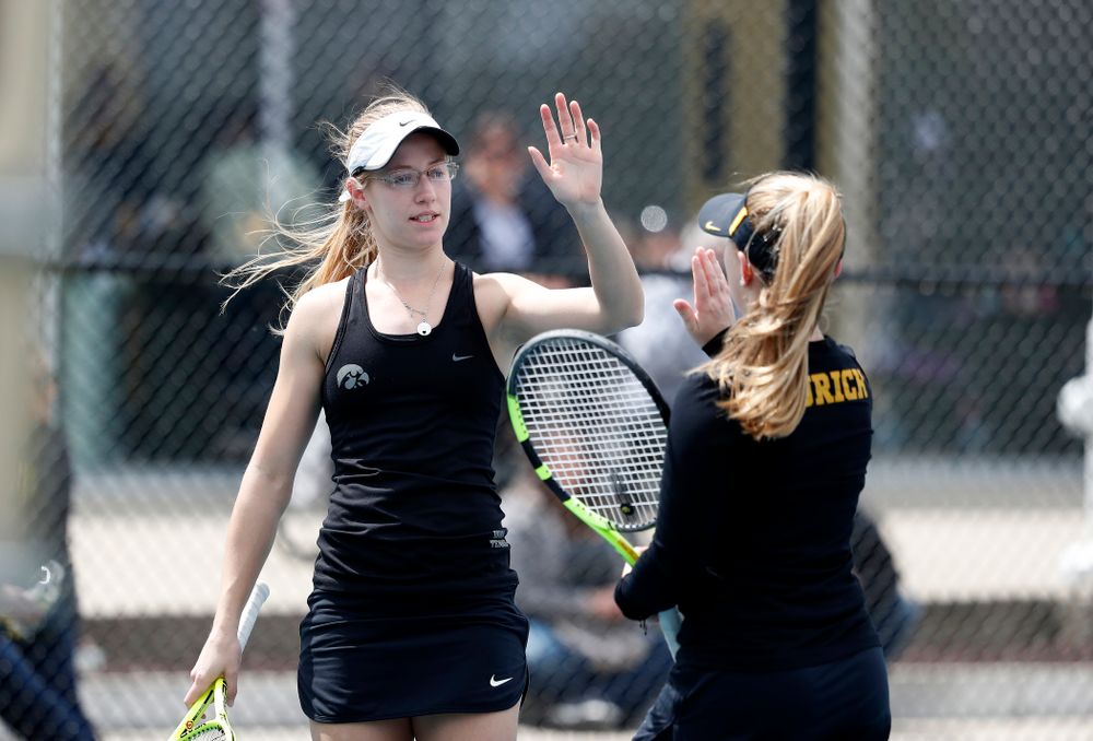 Montana Crawford and Danielle Burich play a doubles match against the Wisconsin Badgers Sunday, April 22, 2018 at the Hawkeye Tennis and Recreation Center. (Brian Ray/hawkeyesports.com)