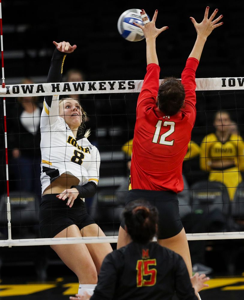 Iowa Hawkeyes right side hitter Reghan Coyle (8) spikes the ball during a match against Maryland at Carver-Hawkeye Arena on November 23, 2018. (Tork Mason/hawkeyesports.com)
