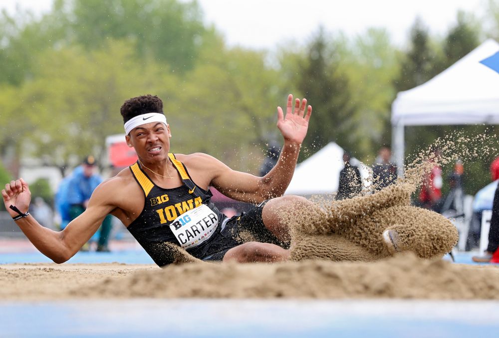 Iowa's James Carter jumps in the men’s long jump event on the second day of the Big Ten Outdoor Track and Field Championships at Francis X. Cretzmeyer Track in Iowa City on Saturday, May. 11, 2019. (Stephen Mally/hawkeyesports.com)
