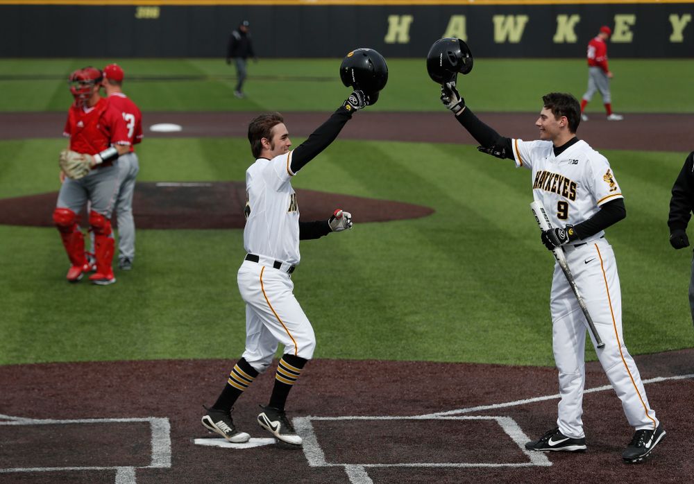 Iowa Hawkeyes outfielder Justin Jenkins (6) and outfielder Ben Norman (9) during a double header against the Indiana Hoosiers Friday, March 23, 2018 at Duane Banks Field. (Brian Ray/hawkeyesports.com)