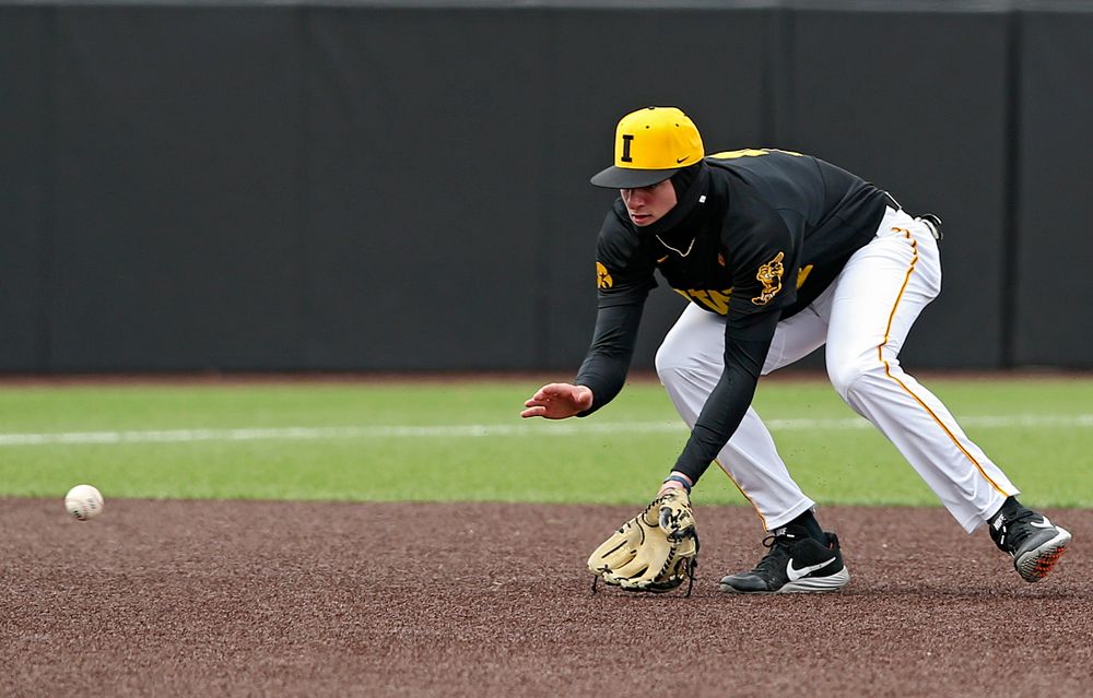 Iowa Hawkeyes third baseman infielder Brendan Sher (2) fields a ground ball during the first inning of their game against Illinois at Duane Banks Field in Iowa City on Saturday, Mar. 30, 2019. (Stephen Mally/hawkeyesports.com)