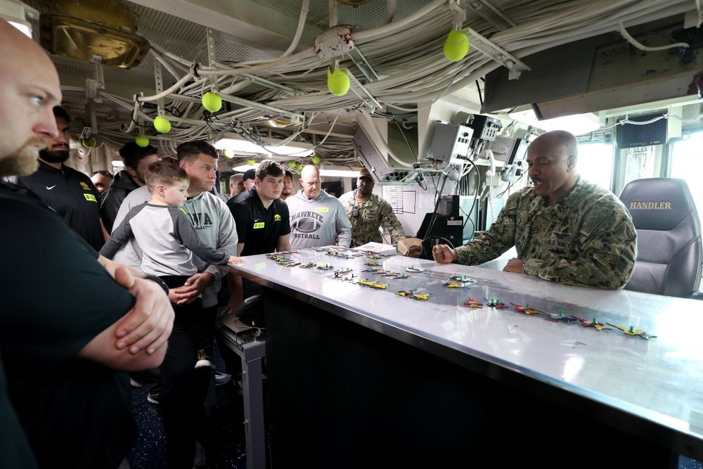Members of the Iowa Hawkeyes tour the USS Theodore Roosevelt (CVN-71) Tuesday, December 24, 2019 at the Naval Base Coronado (Brian Ray/hawkeyesports.com)